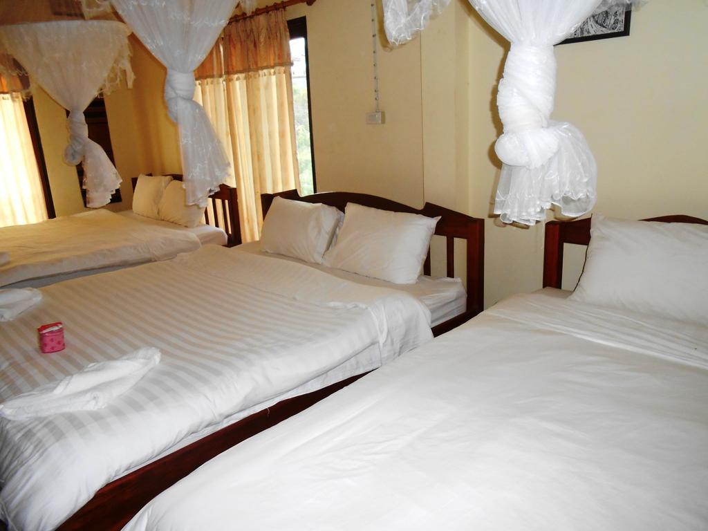 Jammee Guesthouse Vang Vieng Rom bilde