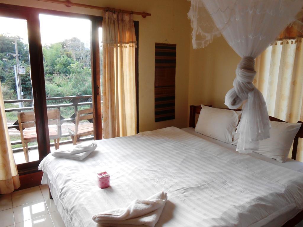 Jammee Guesthouse Vang Vieng Rom bilde