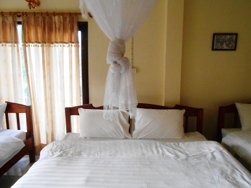 Jammee Guesthouse Vang Vieng Rom bilde