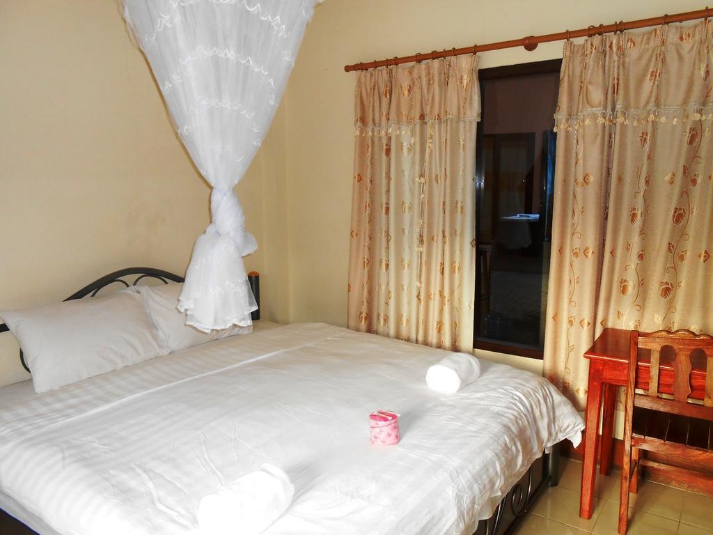 Jammee Guesthouse Vang Vieng Rom bilde