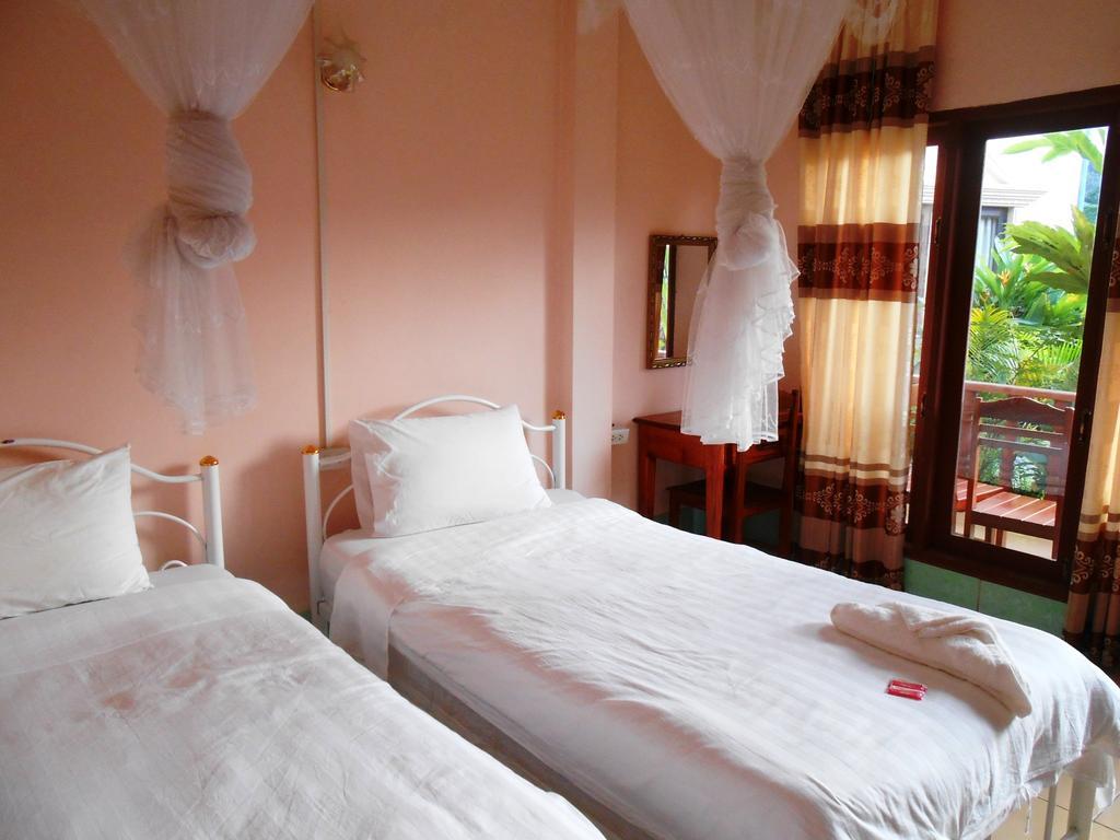 Jammee Guesthouse Vang Vieng Rom bilde