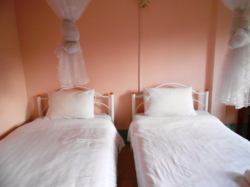 Jammee Guesthouse Vang Vieng Rom bilde